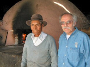 Discus sized bread baking in the village of Oropesa, Peru